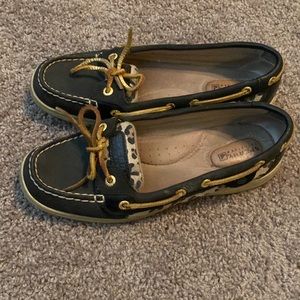 Black Sperry shoes with cheetah print